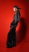 Load image into Gallery viewer, Silk wide leg trousers with pockets - black
