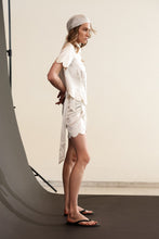 Load image into Gallery viewer, Daisy wrap mini skirt - pearl
