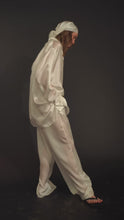 Load and play video in Gallery viewer, Semi-sheer silk wide leg trousers with pockets-pearl
